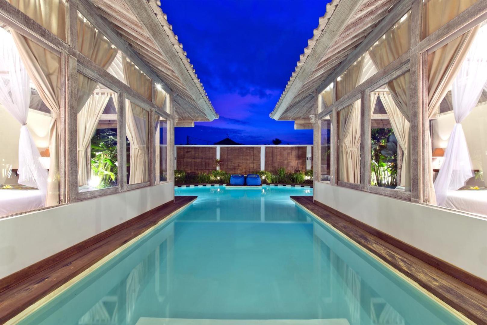 Dusk over the water channel between the bedroom pavilions at Villa Laksmana Hideaway 2