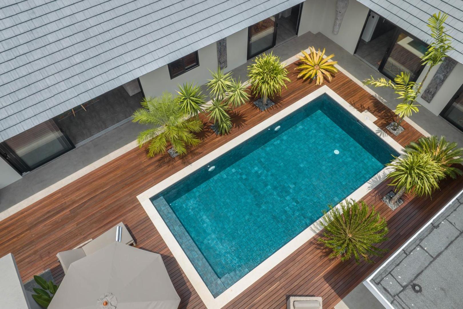 Villa Koya from above: the pool set in its hardwood deck inside a walled courtyard