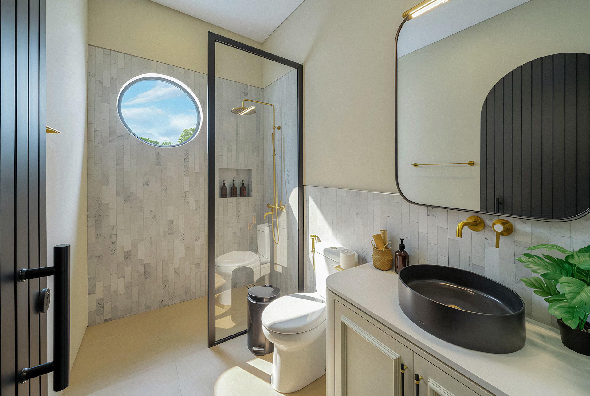 Black stone basin on white joinery under an arched mirror, marble-look tile behind