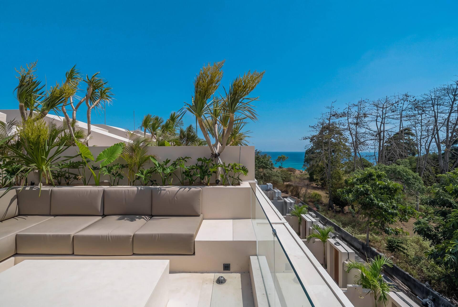 Enso 4's rooftop terrace looks over the treetops of Bingin towards the ocean