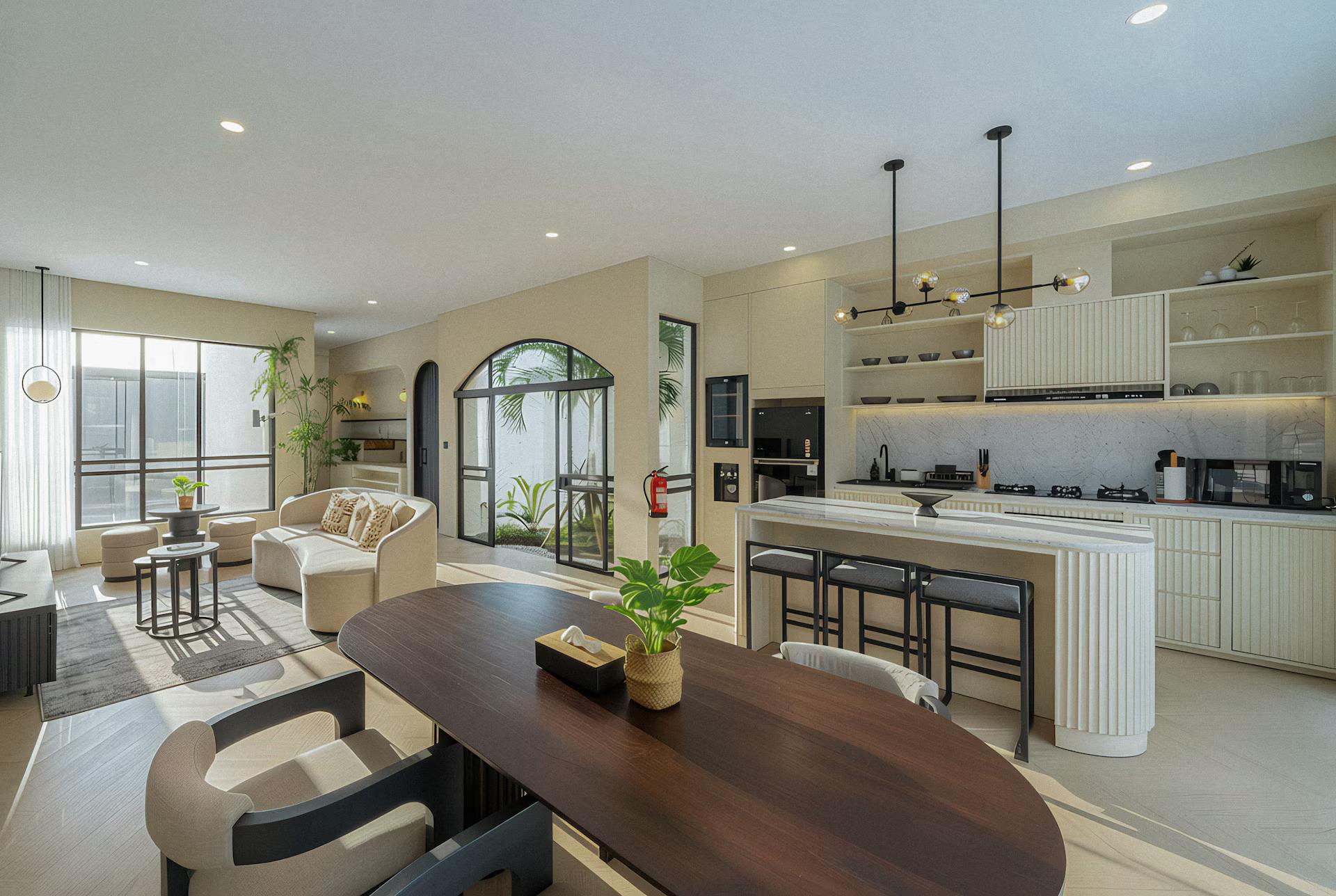 Living, dining and the fluted kitchen island together in one bright volume