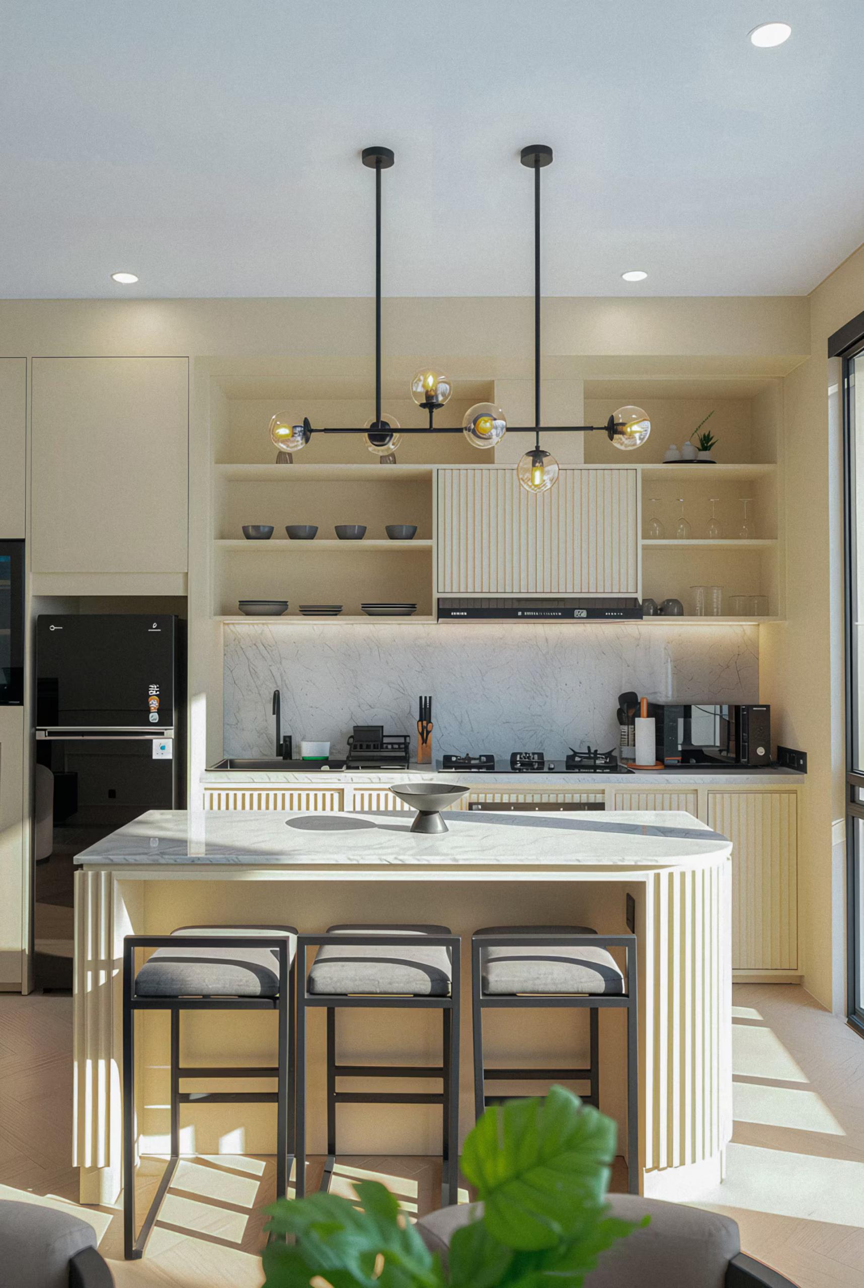 Fluted white kitchen island with three bar stools under a brass globe chandelier