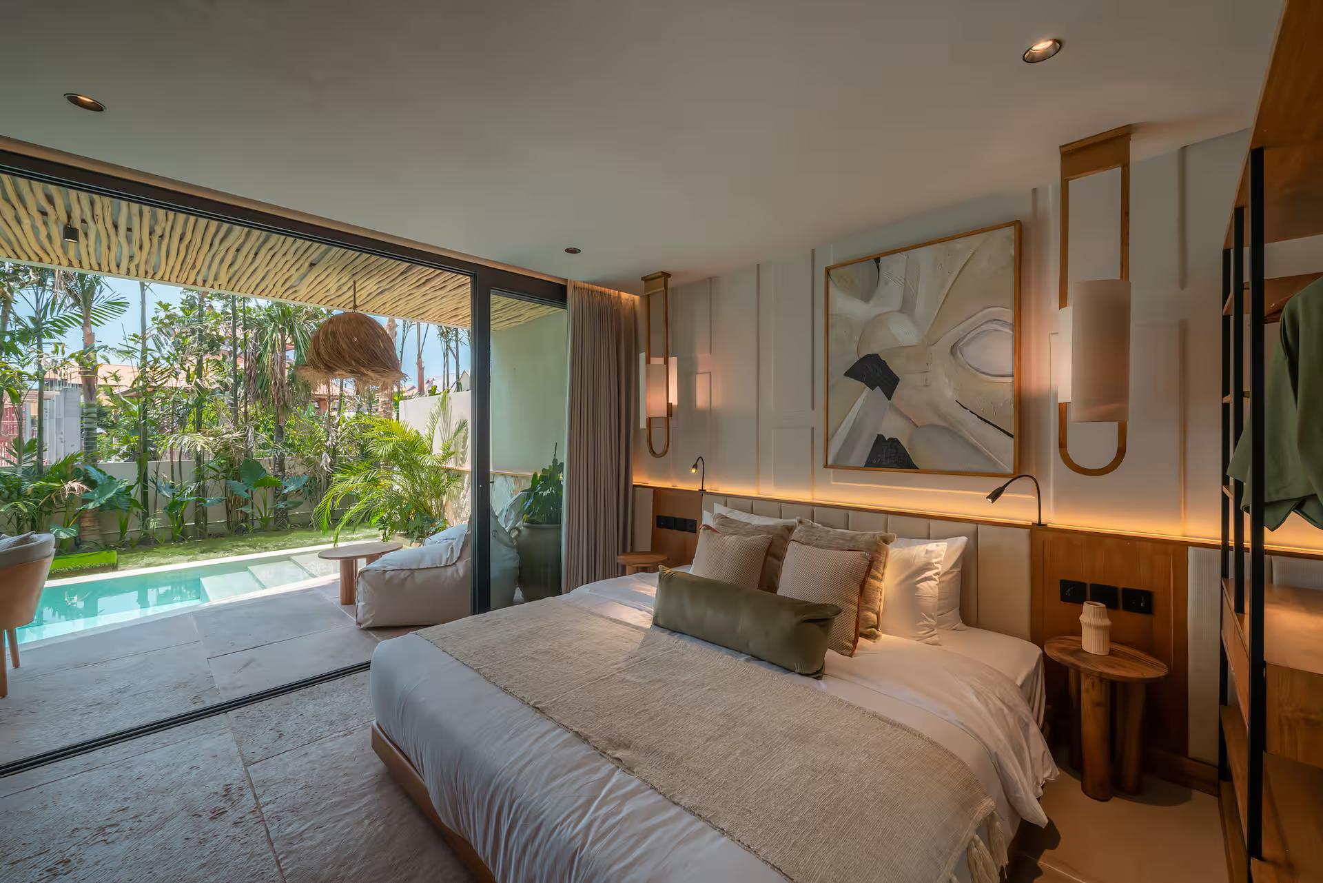 Loft bedroom at Villa Coco Bay opening straight onto its own plunge pool