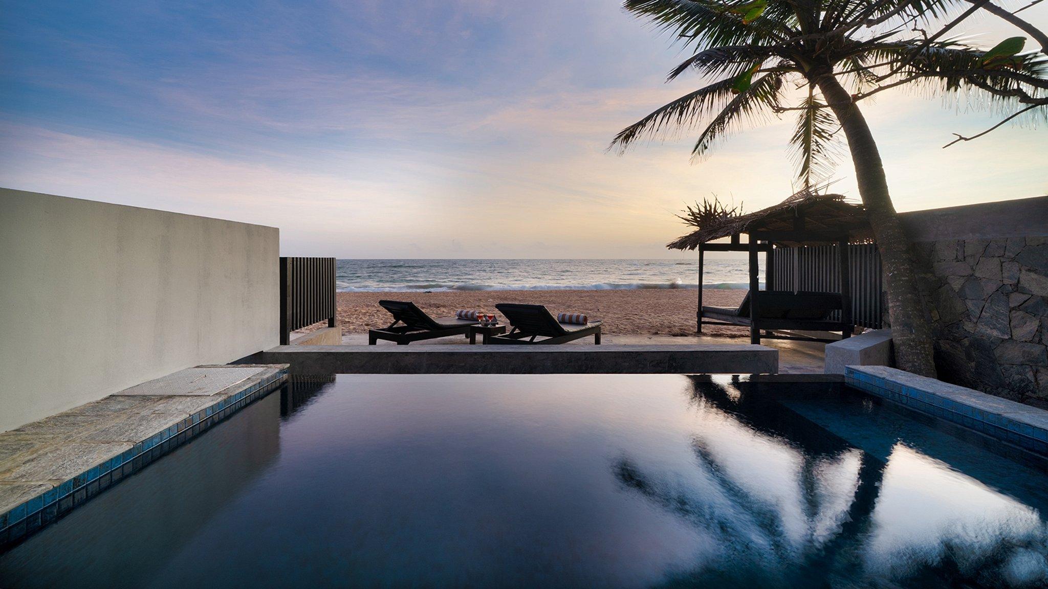 Red Parrot Beach Villa - Photo 2