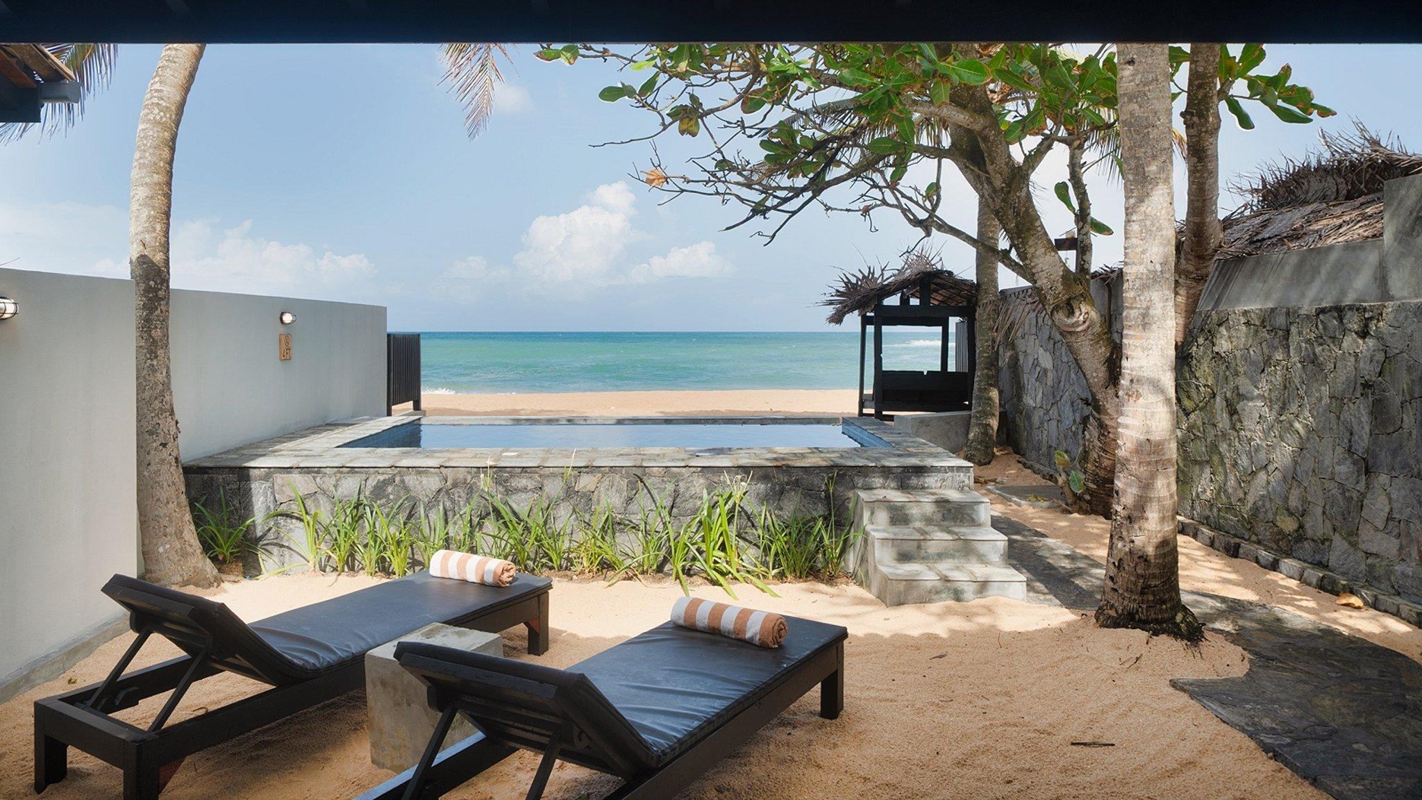 Red Parrot Beach Villa - Photo 4