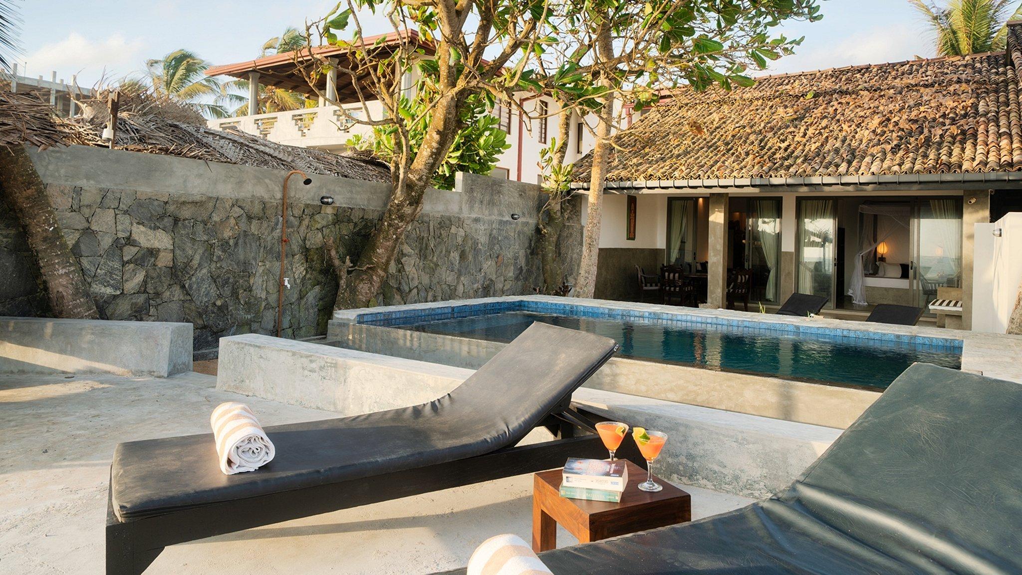 Red Parrot Beach Villa - Photo 5