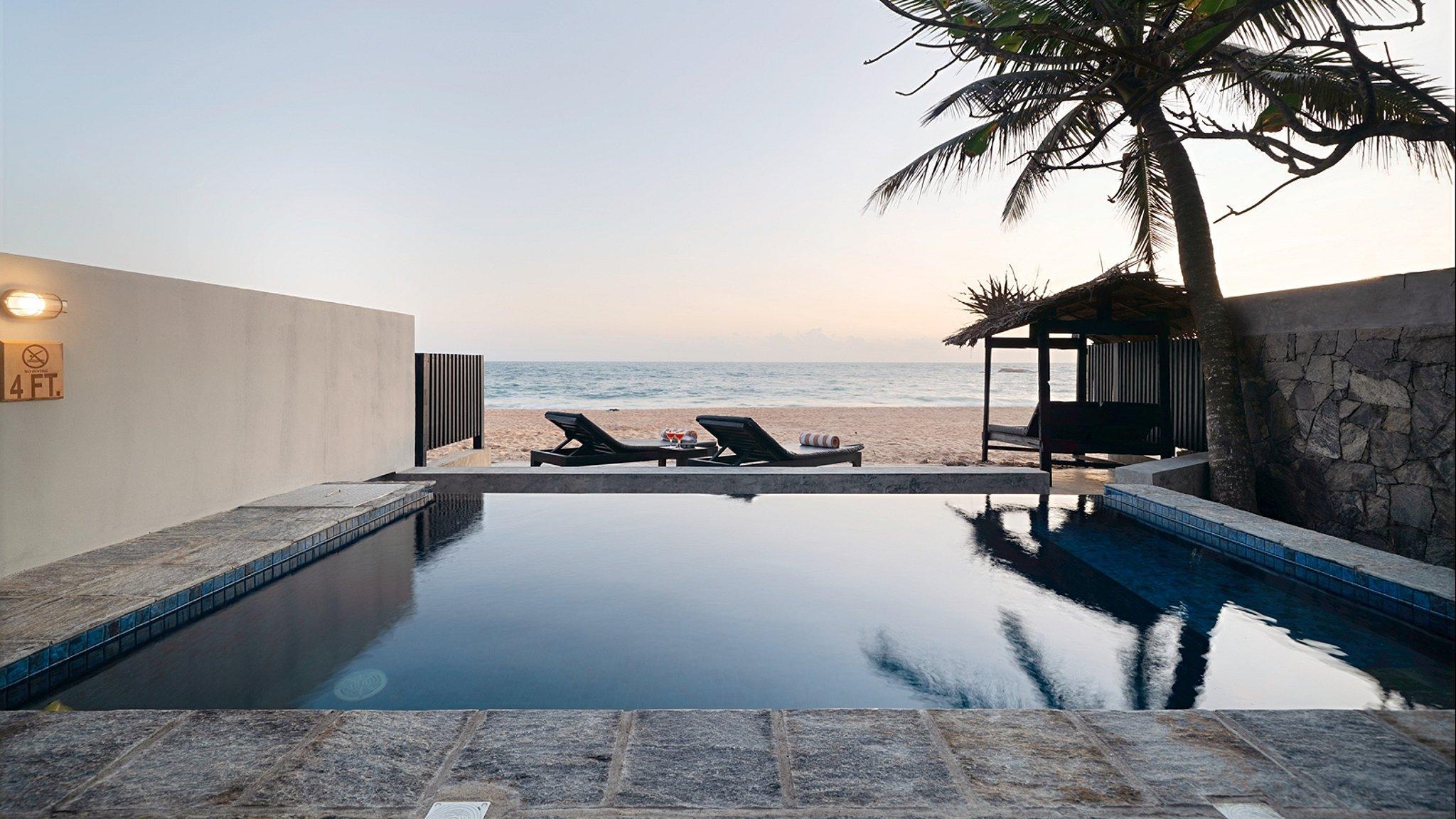 Red Parrot Beach Villa - Photo 6